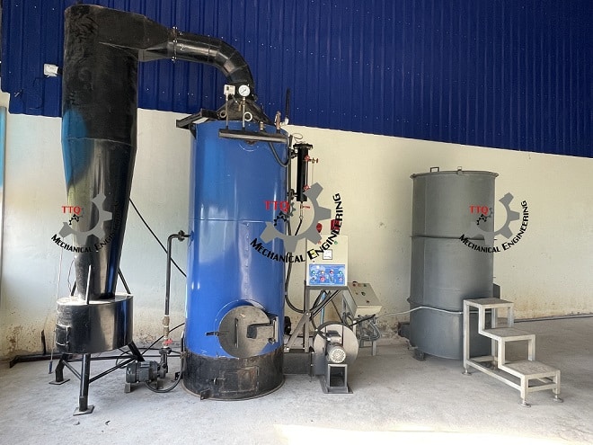 Boiler and steaming machine installed at a cashew factory in Cambodia